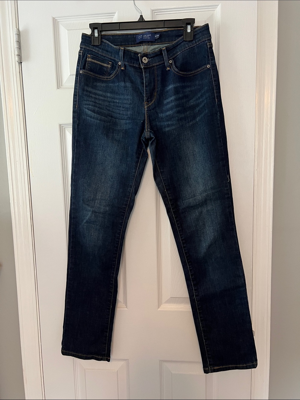 Levi's Women's Straight Leg Jeans in Dark Blue Wash .